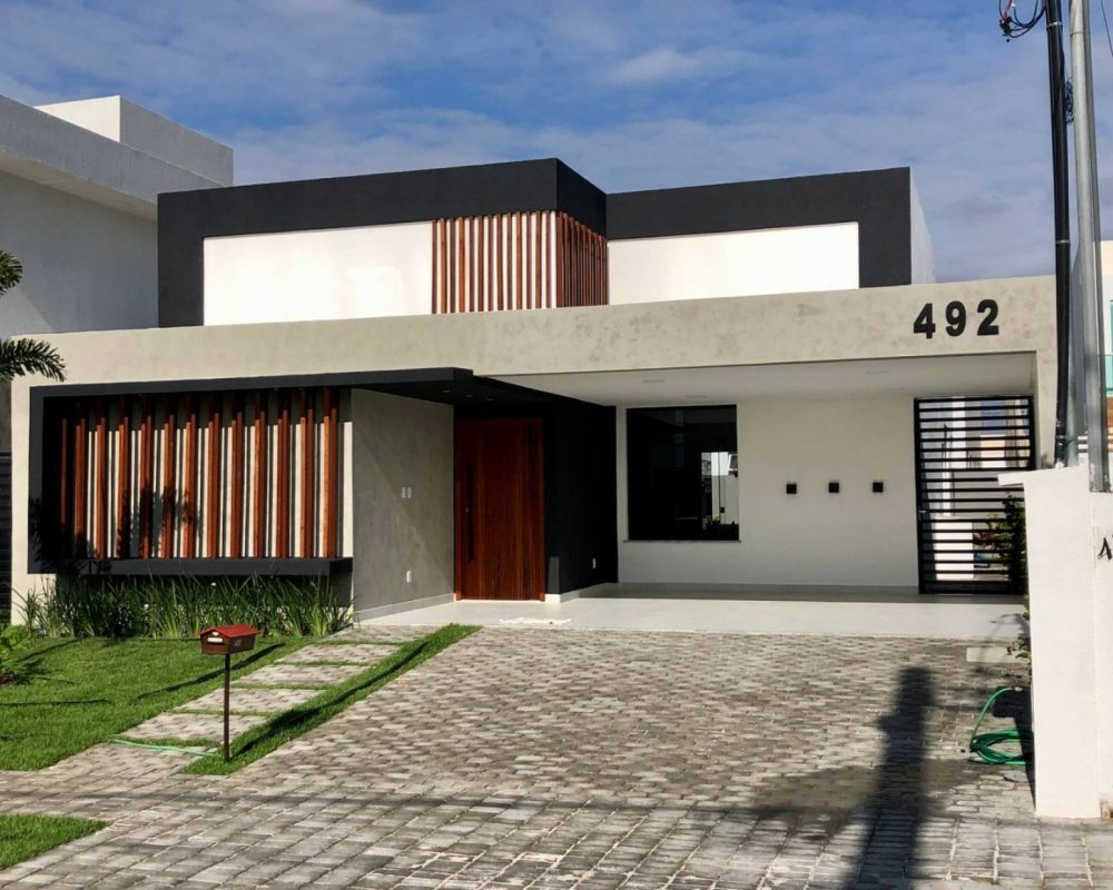 Descubra a harmonia entre modernidade e aconchego nesta casa encantadora no Terras Alphaville I na Barra dos Coqueiros.